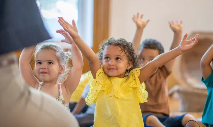 Kids learning together at a table